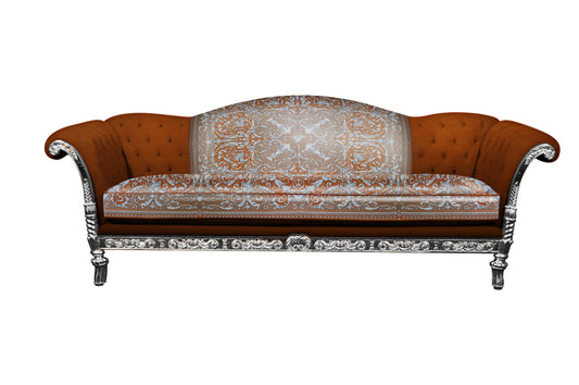 A luxurious 3-seater custom sofa with a baroque design, featuring a heavy dense silk fabric in orange and silver, and a diamond button backrest.
