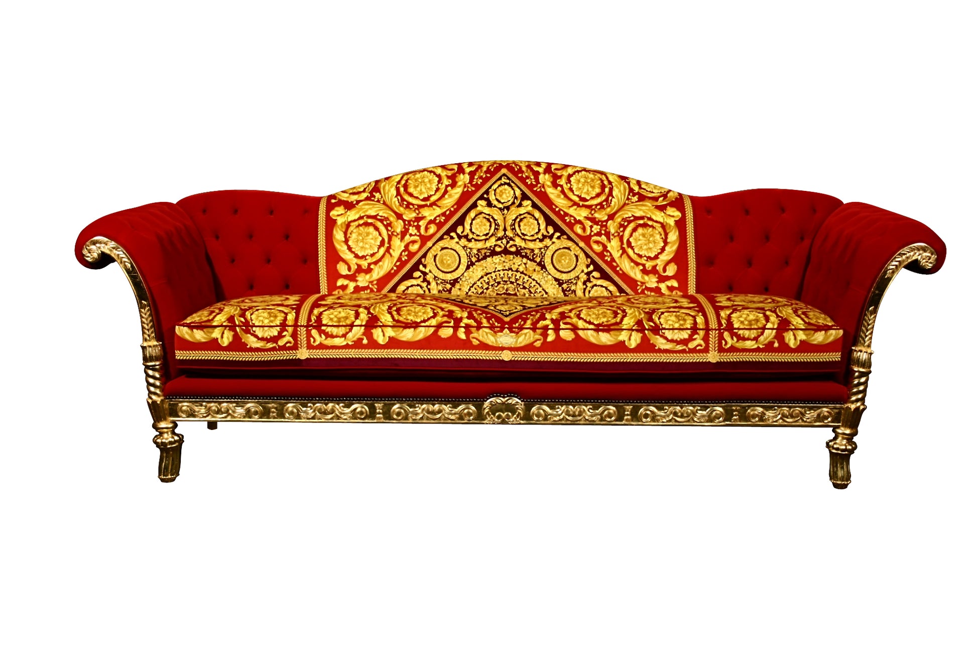 Decorative red and gold sofa with intricate patterns on a white background