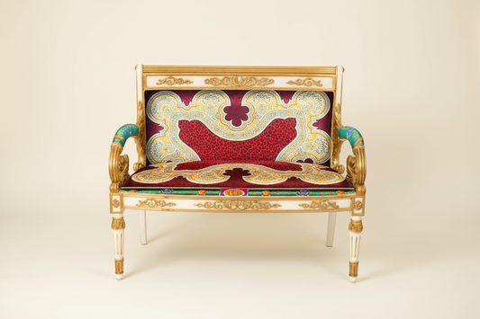 Full front-facing hero shot of the Luxury Custom Vanitas 2-Seater Loveseat with Gold & White Lacquer finish and Gianni Versace Red Vintage Medusa fabric against a clean soft luxury background