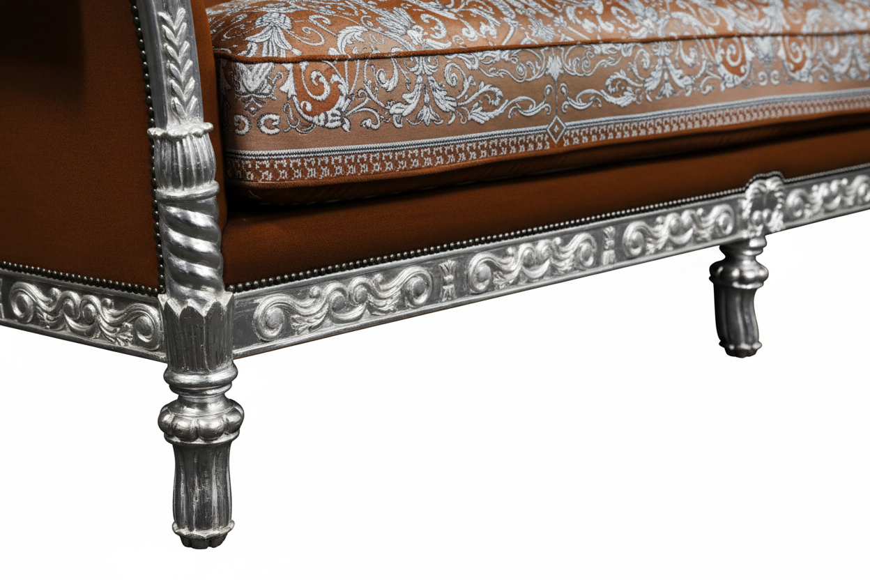 Close-up of ornate hand-carved silver leaf base and legs on the Luxury Custom Tzar 3-Seater Sofa